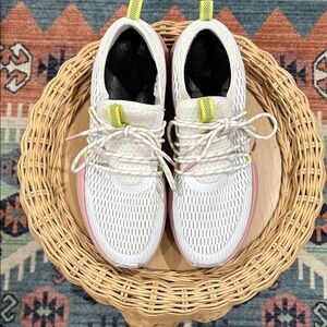 Sorel Women's White and Pink Athletic Shoes with Yellow Accents